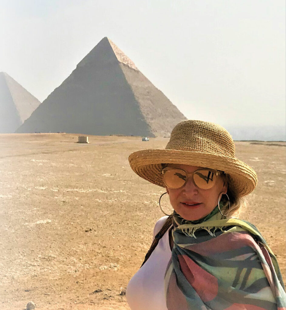 Jana standing in front of a pyramid